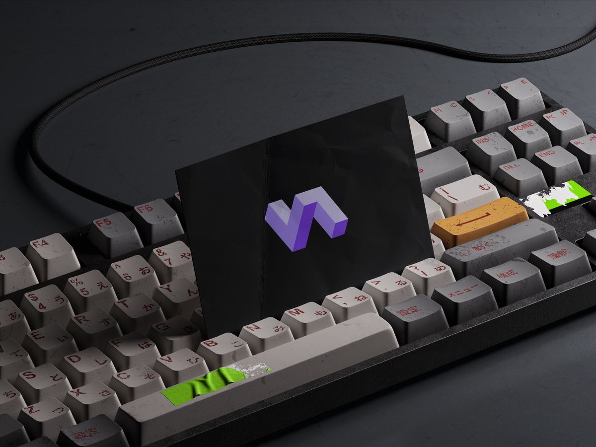 Verge Labs brand cover: the violet symbol on a card resting on a keyboard